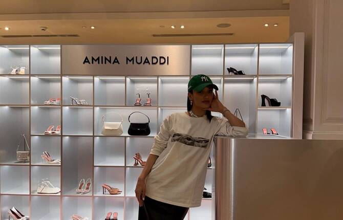 Introduction To Amina Muaddi's Paris Celebration At Le Bon Marche